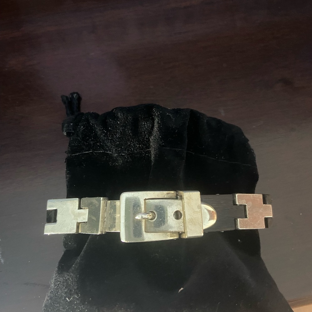 Sterling shiny silver buckle bracelet with ebony wood inlay